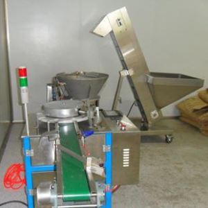 Condiment capping machine